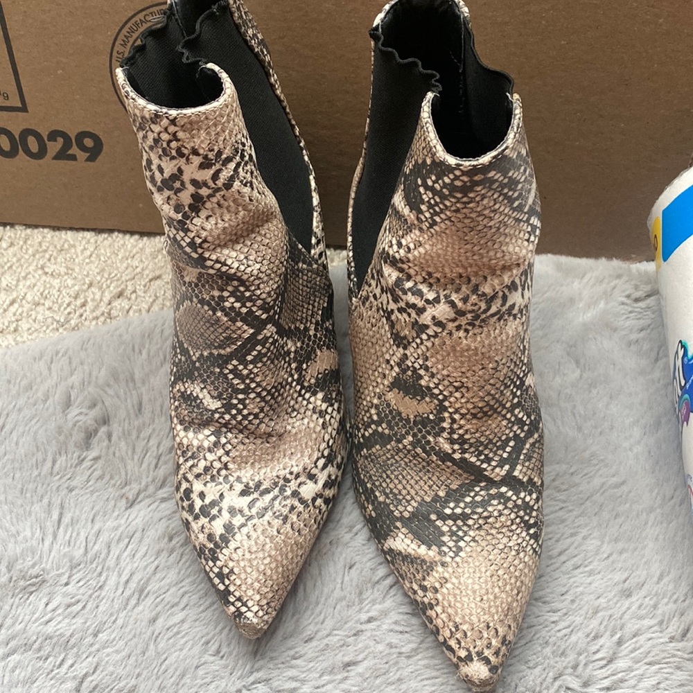 Women’s snake skin print booties